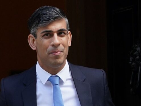 Prime Minister Rishi Sunak has set out an ambition to scrap national insurance contributions (Lucy North/PA)