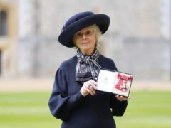 Diana Parkes after being made a CBE at an investiture ceremony at Windsor Castle (Andrew Matthews/PA)