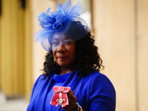 Dr Gee Walker after being made a Member of the Order of the British Empire (Victoria Jones/PA)