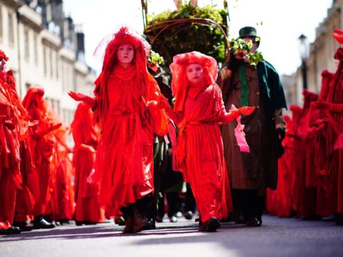 Red Rebels take part in a Funeral for Nature procession (Ben Birchall/PA)