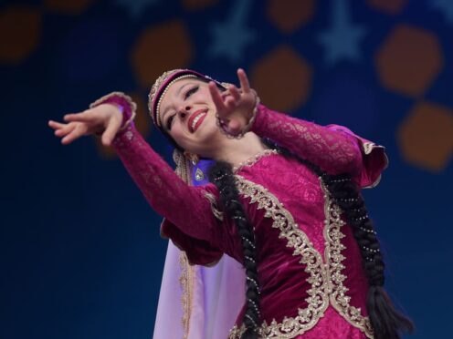 A performer from Cultural Style Week on stage during Eid in the Square celebrations (Yui Mok/PA)