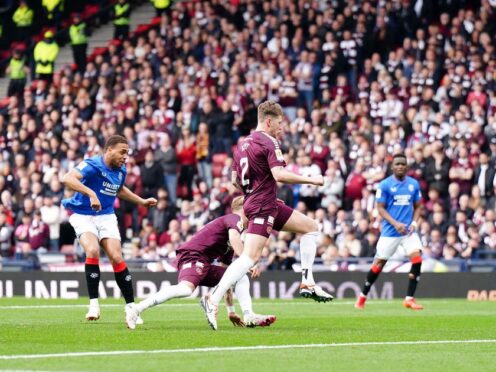 Rangers’ Cyriel Dessers (left) scores against Hearts (Andrew Milligan/PA)