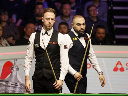 Hossein Vafaei, right, made his opinions clear after crashing out to Judd Trump at the Crucible (Richard Sellers/PA)