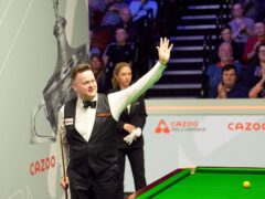 Shaun Murphy is through to the second round of the World Championship (Martin Rickett/PA)