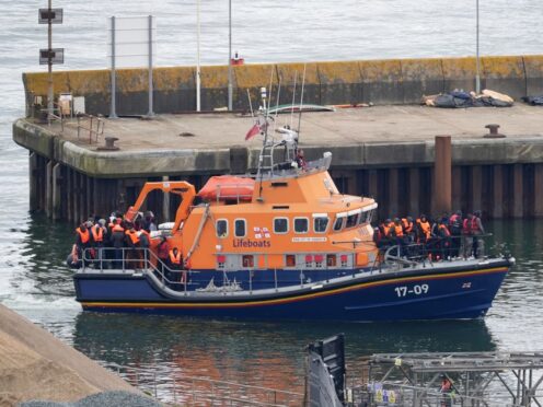 More than 400 migrants arrived in the UK on the day five people including a child died while trying to cross the Channel (Gareth Fuller/PA)