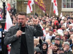 Tommy Robinson speaking during a St George’s Day event on Whitehall, in Westminster, central London (Jordan Pettitt/PA)