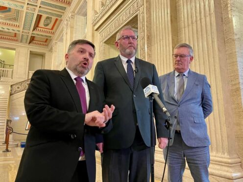Health Minister Robin Swann (left), UUP leader Doug Beattie (centre) and UUP MLA Mike Nesbitt (David Young/PA)