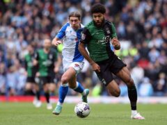 Blackburn Rovers’ Callum Brittain (left) and Coventry City’s Ellis Simms battle for the ball (Barrington Coombs/PA)
