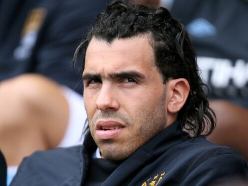 Former Argentina striker Carlos Tevez has been admitted to hospital with chest pains (PA)