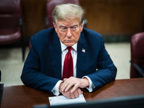 Former president Donald Trump is pictured in a Manhattan criminal court ahead of the start of jury selection in New York on April 15, 2024 (Photo by Jabin Botsford/Washington Post via AP, Pool, File)