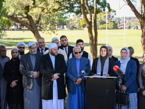 Ramia Abdo Sultan, lawyer and communications relations advisor of the Australian National Imams Council with Imams speaks during a press conference in Sydney (Dean Lewins/AP)