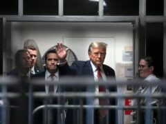 Donald Trump returns from a break in his trial at Manhattan Criminal Court (Michael Nagle/New York Post via AP)