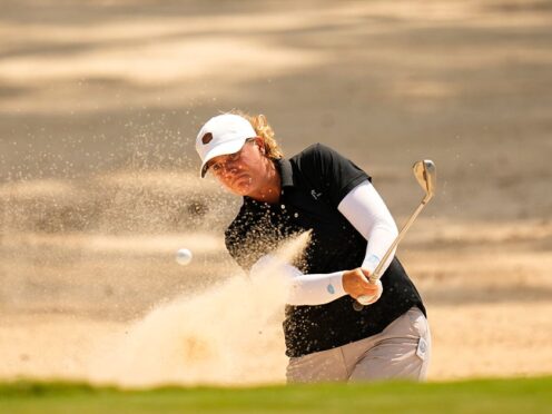 Lauren Coughlin hit from the bunker on the eighth green during the first round at the Chevron Championship (Eric Gay/AP)