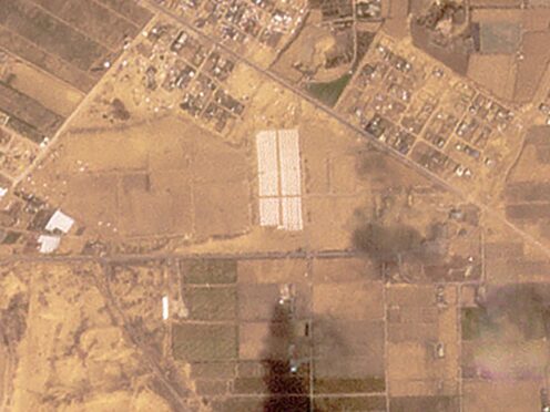 A satellite image appears to show tents being constructed near Khan Younis in the Gaza Strip (Planet Labs PBC via AP)