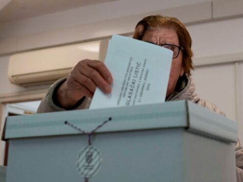 Croatians are voting in a parliamentary election following a campaign centred on a bitter rivalry between the president and prime minister (Darko Vojinovic/AP)