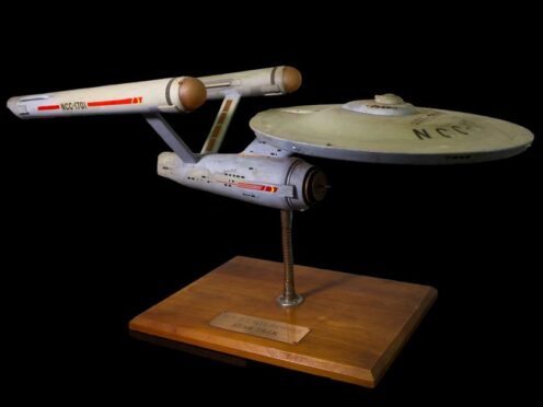The first model of the USS Enterprise has finally returned home, decades after going missing (Josh David Jordan/Heritage Auctions via AP)