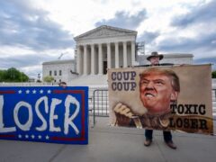Activist Stephen Parlato joins protesters outside the Supreme Court (J. Scott Applewhite/AP)