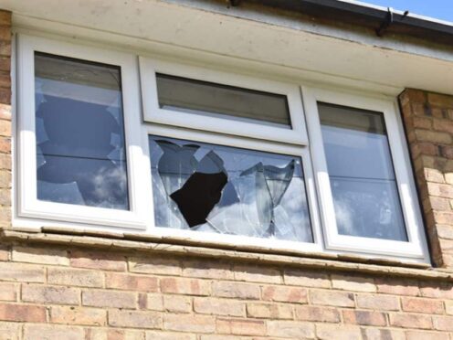 A damaged window at Matthew Haydon’s home (Bedfordshire Police/PA)