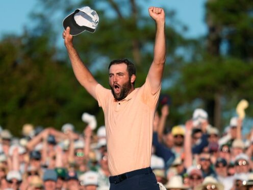 Scottie Scheffler celebrates his win at the Masters golf tournament at Augusta National Golf Club (Ashley Landis/AP)