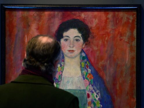 A man looks at the painting Portrait of Fraulein Lieser (Christian Bruna/AP)