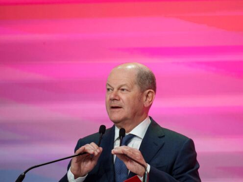 German Chancellor Olaf Scholz speaks during the Party of European Socialists Leaders’ Conference in Bucharest, Romania (Andreea Alexandru/AP)