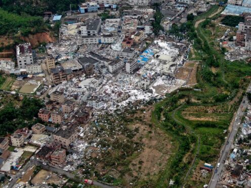 An aerial view shows damaged buildings in the aftermath of a tornado in Guangming village, Guangzhou (Deng Hua/Xinhua/AP)