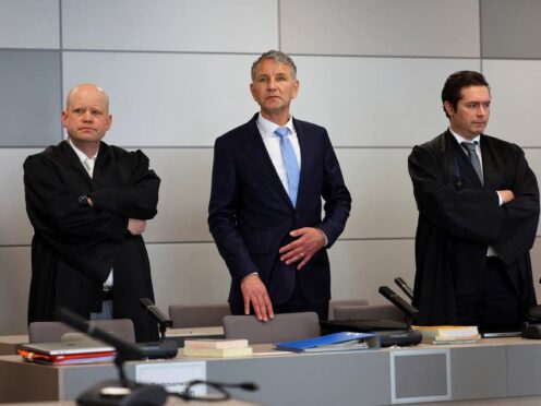 German far-right politician of the Alternative for Germany (AfD) Bjorn Hocke, centre, attends his trial in the state court in Halle, Germany (Fabrizio Bensch/AP)