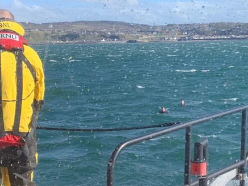 Four young paddleboarders were rescued from Cullen Bay, Moray by the RNLI Buckie crew (Graham Campbell/RNLI/PA)