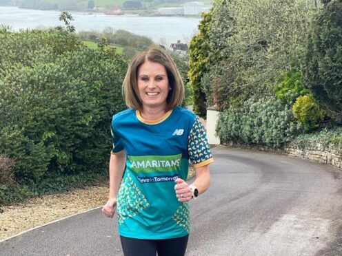 A woman running the TCS London Marathon on the anniversary of her father’s death is raising money for the “life-saving” work of Samaritans (Handout/PA)