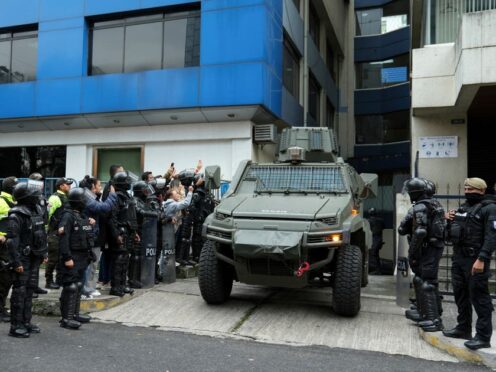 A military vehicle transports former Ecuadorian vice president Jorge Glas from the detention centre where he was held after police broke into the Mexican Embassy to arrest him in Quito, Ecuador (Dolores Ochoa/AP)