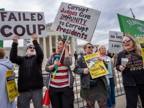 Protesters demonstrate outside the Supreme Court (J. Scott Applewhite/AP)