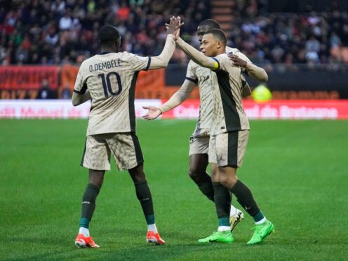 Kylian Mbappe (right) and Ousmane Dembele celebrate during Paris St Germain’s win over Lorient (Michel Euler/AP)