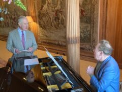 The King with Lord Lloyd Webber at Dumfries House last year (Sir Clive Alderton/PA)