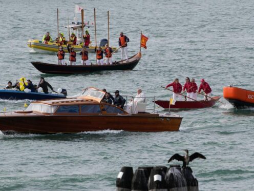 Pope Francis is greeted by gondoliers upon his arrival in Venice, Italy (Alessandra Tarantino/AP)
