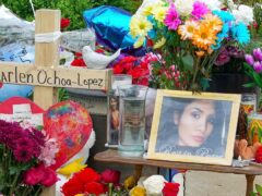 A memorial of flowers, balloons, a cross and photo of victim Marlen Ochoa-Lopez in Chicago in 2019 (Teresa Crawford/AP)