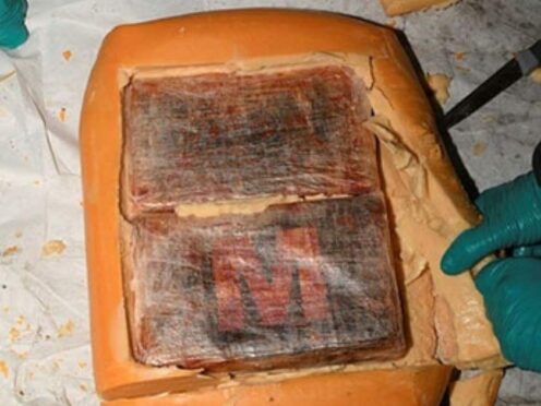 Blocks of cocaine were found inside gouda cheese following a raid in Blackburn, Lancashire (Lancashire Constabulary/PA)