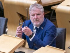 External Affairs Secretary Angus Robertson was quizzed in Holyrood over the cost of his overseas trips (Jane Barlow/PA)