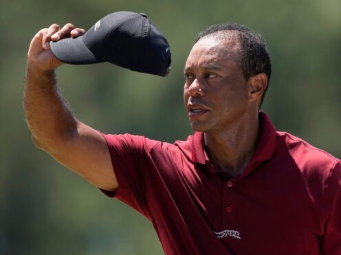 Tiger Woods waves after his final round in the 88th Masters (David J. Phillip/AP)