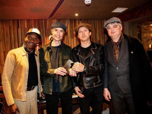 The Libertines pose with their official number one album award from Official Charts for All Quiet On The Eastern Esplanade (Official Charts Company/PA))