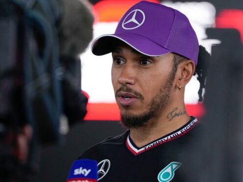 Mercedes driver Lewis Hamilton talks to reporters after qualifying (AP Photo/Hiro Komae)