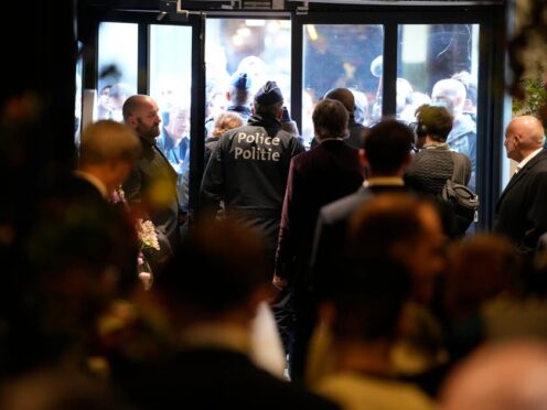 Police at the front entrance during the National Conservatism conference in Brussels (Virginia Mayo/AP)