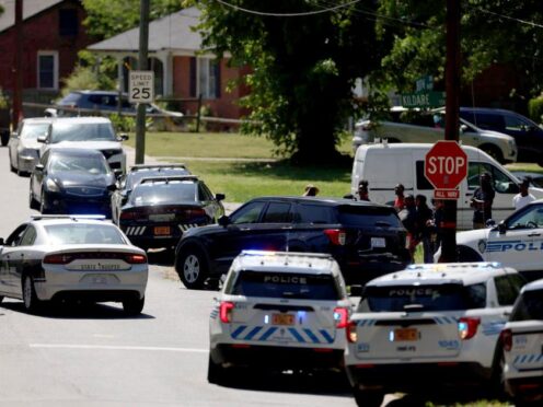 Multiple law enforcement vehicles respond in the neighborhood where several officers on a task force trying to serve a warrant were shot (Khadejeh Nikouyeh/The Charlotte Observer via AP/PA)