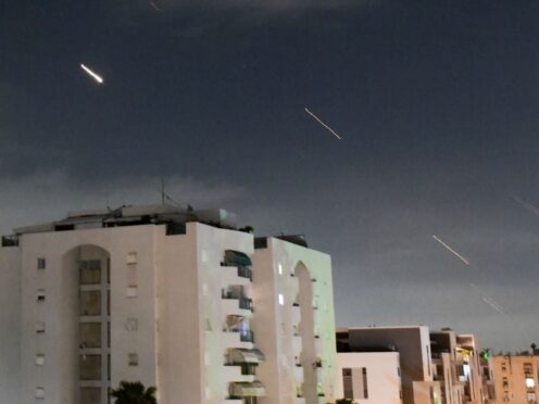 Israeli Iron Dome air defence system launches to intercept missiles (Tomer Neuberg/AP)