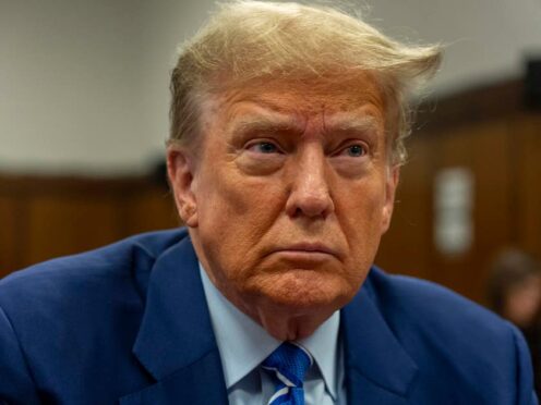 Former President Donald Trump awaits the start of proceedings on the second day of jury selection at Manhattan criminal court (Mark Peterson/AP)