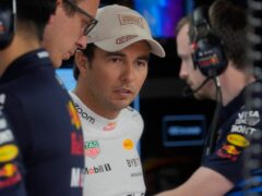 Red Bull driver Sergio Perez of Mexico is in garage before the third free practice ahead of the Formula One Monaco Grand Prix at the Monaco racetrack, in Monaco, Saturday, May 25, 2024. (AP Photo/Luca Bruno)