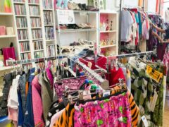 Secondhand clothes in a charity shop in London (Alamy/PA)