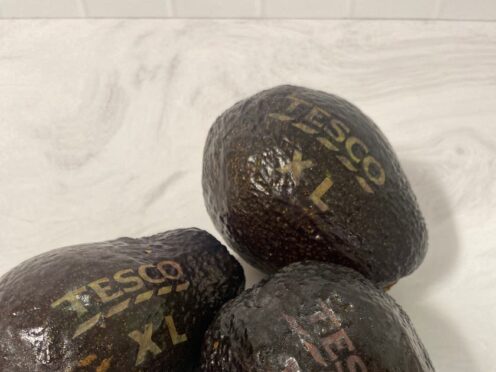 Tesco is to use laser-etchings on its extra large avocados instead of stickers in a trial designed to help the environment (Tesco/ PA)