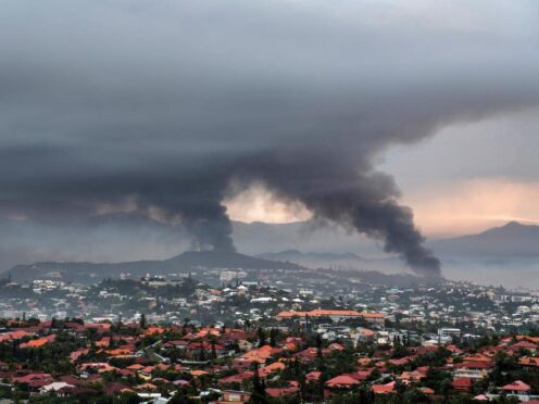 Smoke rises during protests in Noumea, New Caledonia (Nicolas Job, AP)