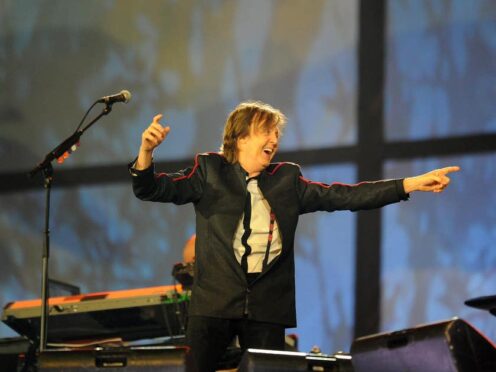 Paul McCartney performing during the London Olympic Games 2012 Opening Ceremony (Owen Humphreys/PA)