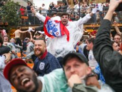 Fans celebrate during the UEFA Euro 2020 round of 16 match between England and Germany at the Vinegar Yard pub in London (Kieran Cleeves/PA)